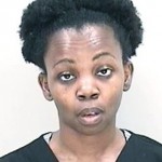 Shana Johnson, 33, Expired tag, state court bench warrant