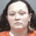 Melissa Hall, 35, Grand jury arrest warrant