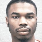Timothy Garnett Jr, 22, Drug possesion with intent to distribute, drug possession x2, weapon possession